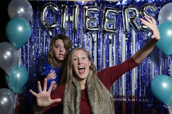 Festival supporters Debralyn Lazarescu (left) and Hannah Chargin (right) in the photo booth at the Cheers to BWiFF 2017 Fundr